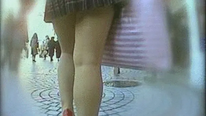 While In The Streets For Window Shopping, Lady In Short Skirt Has Her Panty Peeping Out - Full version