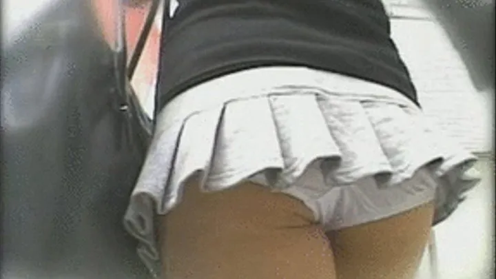 Lady Walks In The Streets With A Very Short Skirt, Resulting To Her Panty Peeping Out - Full version