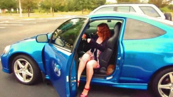 Mature woman racing a car pedal on the Floor with