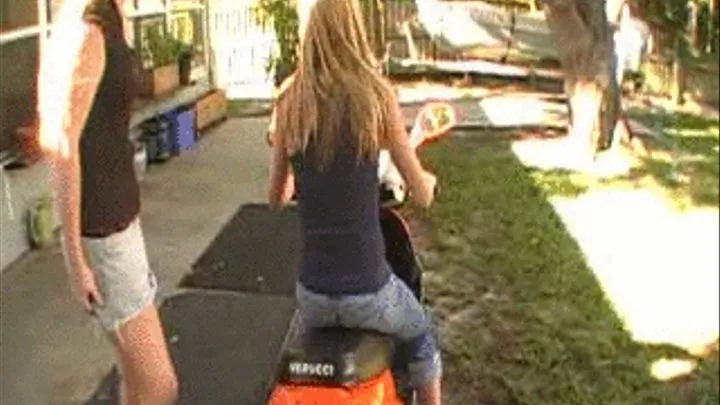 Two girls on a Scooter get stuck