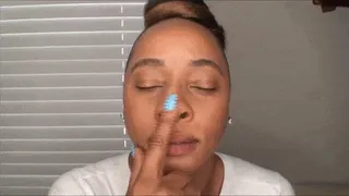 Kendra plays with her nose