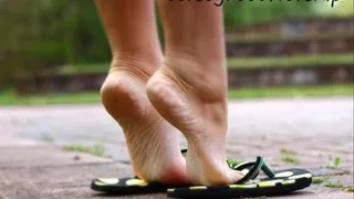 Goddess May footplay in the park.