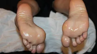 Frenchy's rubs her oily soles together