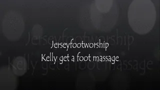 Kelly gets a foot massage