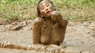 Nina Enjoys Mud Pole Arousal