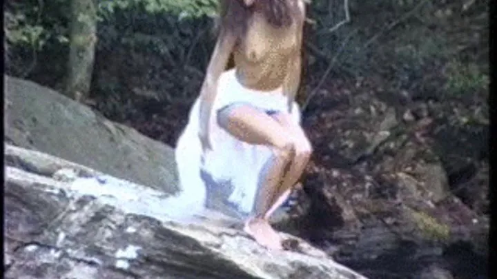 Outdoor naked babe by the river