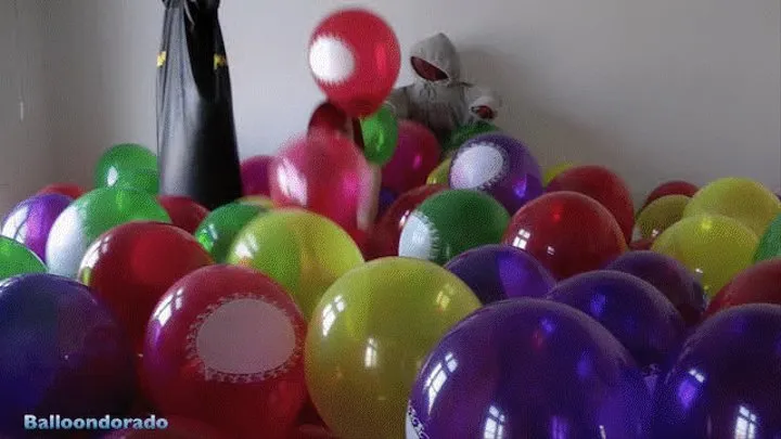 Anne, Jaqui and Pati burst a sea of balloons