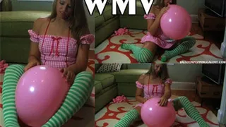Zoe deflates her big pink balloon