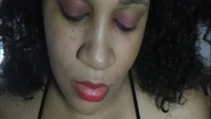 Applying Red Lipgloss on my ebony lips