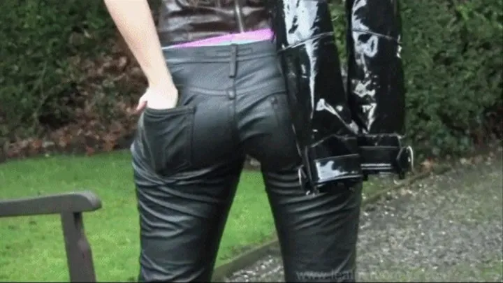 Busty Emma Green in Leather Walk