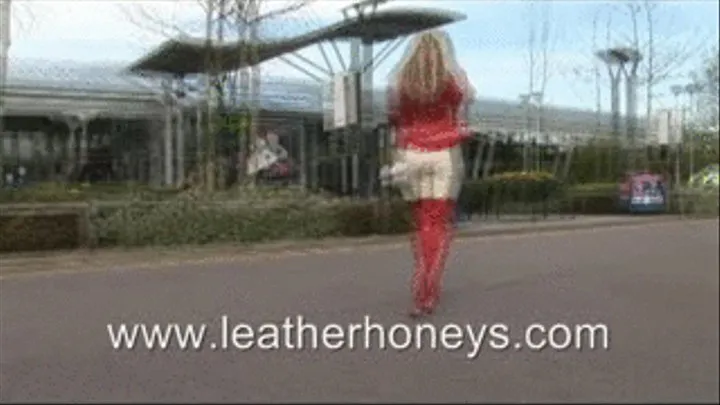 Babe at Motorway Services in Leather Trousers & Red Thigh Length Boots