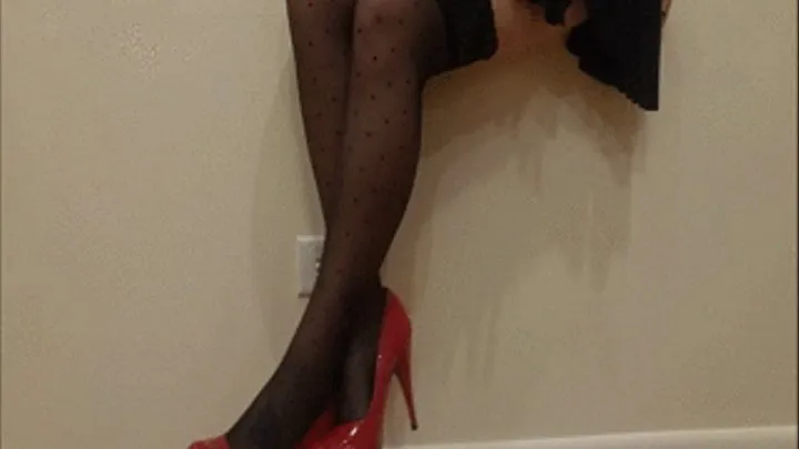 Eve Dangling Her Red Heels