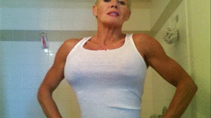 Muscle Goddess Rips Out Of Tight Wet T-Shirt