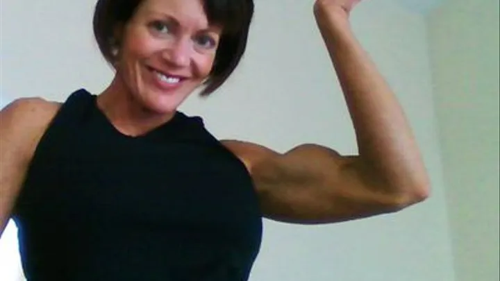 Muscle Goddess Teases you with Her Amazing Bicep!