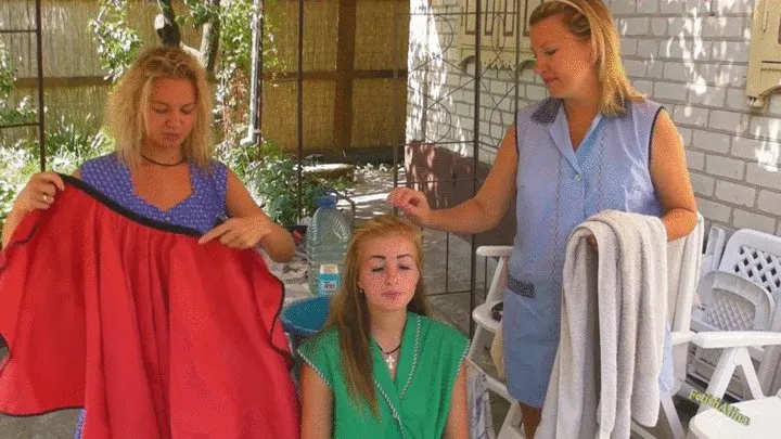 Nikki gets her hair washed outdoors by Alina and Christina in smocks