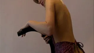 Sexy vacuuming in pantyhose and apron