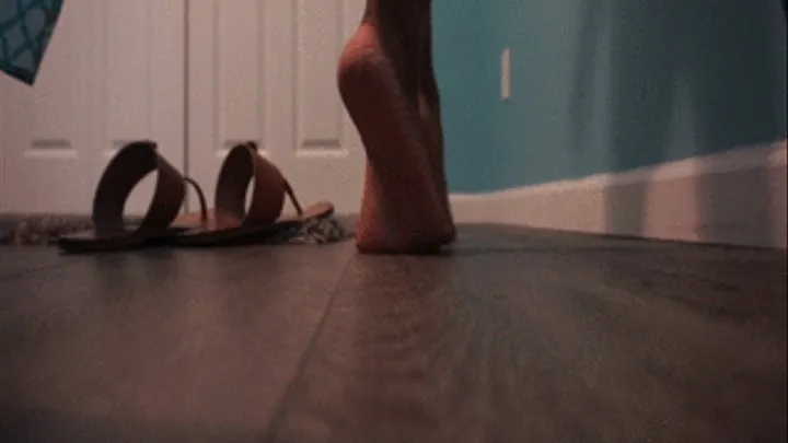 Essence showing off her high arched, curvy and super wrinkled size 9.5 soles from a rear view floor level point of view! Clip 3