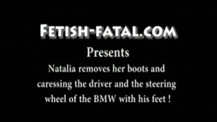 Natalia retire ses bottes et caresse le conducteur et le volant de la BMW avec ses pieds......Natalia removes her boots and caressing the driver and the steering wheel of the BMW with his feet