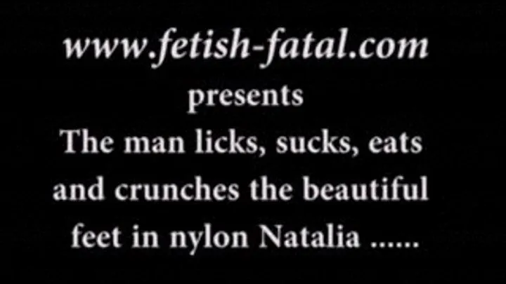 The man licks, sucks, eats and crunches the beautiful feet in nylon Natalia ...........L'homme lèche, suce, dévore et croque les superbes pieds en nylon de Natalia......