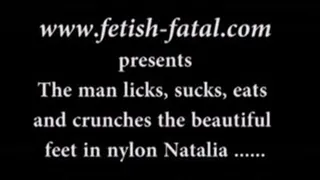 The man licks, sucks, eats and crunches the beautiful feet in nylon Natalia ...........L'homme lèche, suce, dévore et croque les superbes pieds en nylon de Natalia......