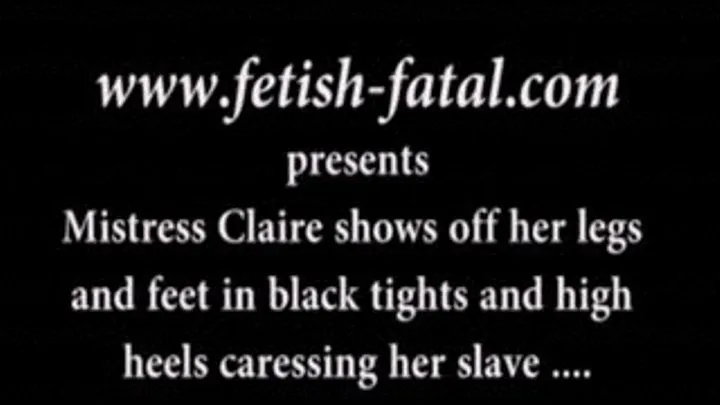 Maitresse Claire exhibe ses jambes et pieds en collant noir et escarpins que step-son esclave caresse.......Mistress Claire shows off her legs and feet in black tights and high heels caressing her slave ...