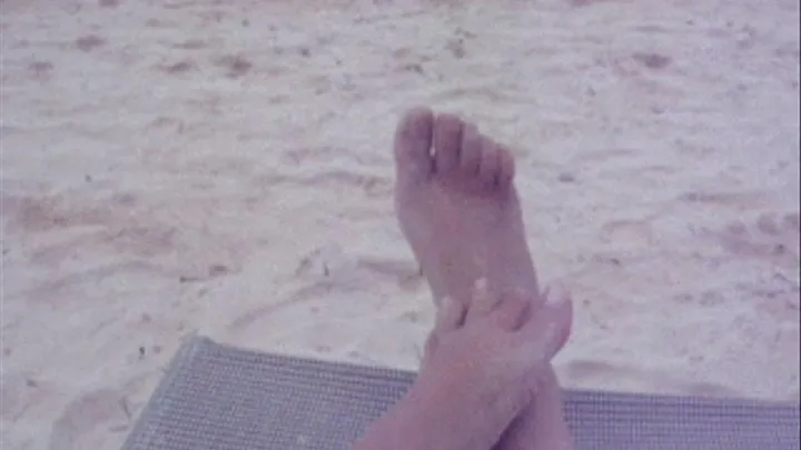 Wet and muddy feet on beach