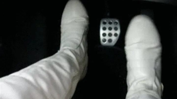 Driving in white boots and pantyhose.