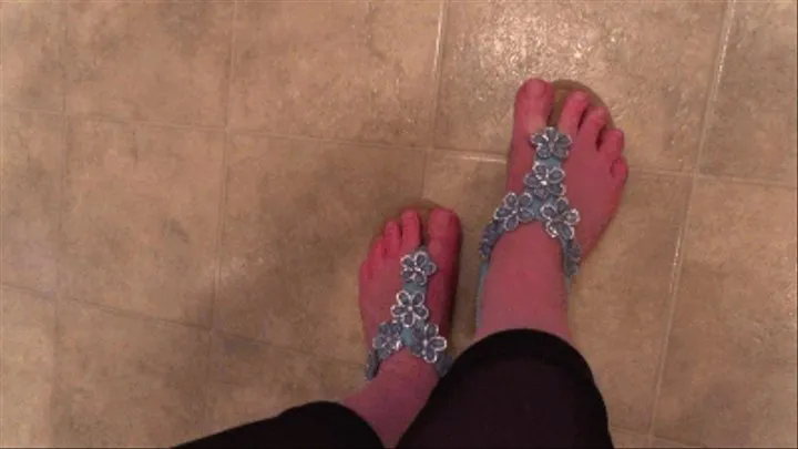 Cute bare feet in summer sandal