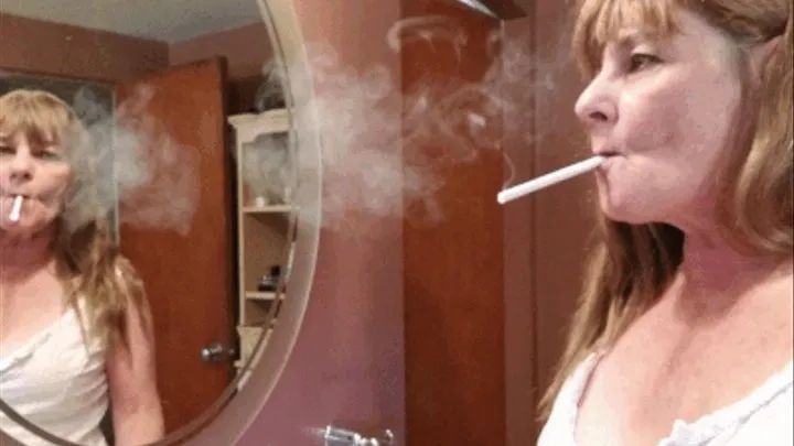 Smoking in front of my bathroom mirror