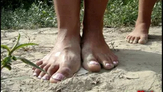 Dirty feet in sand ...