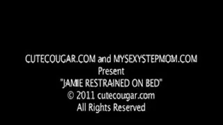 Jamie Restrained on the Bed