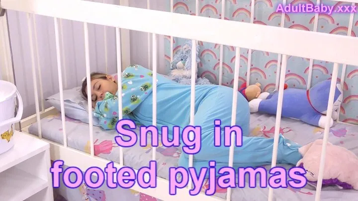 Snug in footed pyjamas