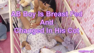 AB Boy Is Breast Fed And Changed In His Cot