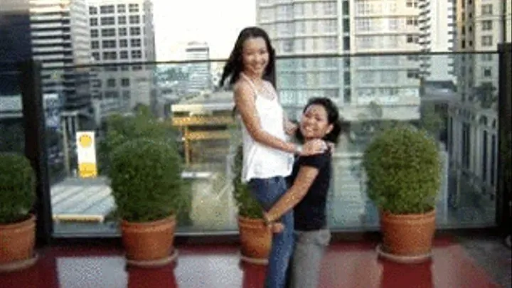 Short Girl Lifting Tall Girl