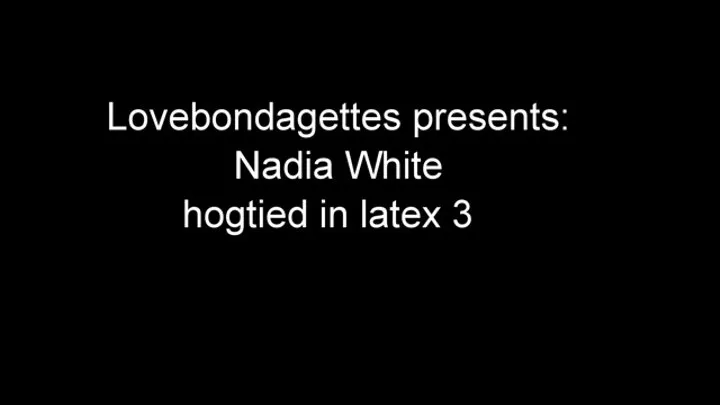 Nadia White hogtied in latex part 3