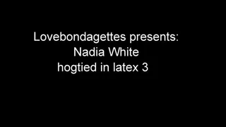 Nadia White hogtied in latex part 3