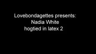 Nadia White hogtied in latex part 2