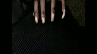 Black woman's veiny hands with long unpolished nails pt 2