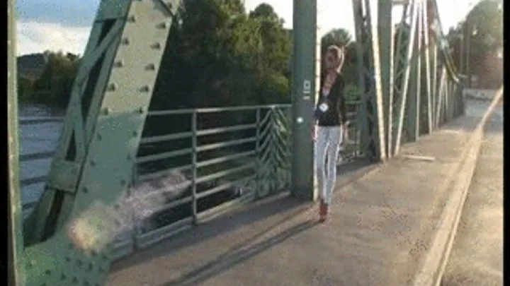 PUBLIC WALKING ON A BRIDGE IN PINK HIGH HEELS AND JEANS