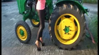 TAMIA PEDAL PUMPING A TRACTOR IN NYLON & LEGGINS HIGH HEELS