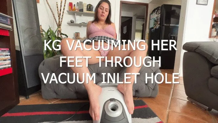 KG VACUUMING HER FEET THROUGH VACUUM INLET HOLE