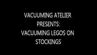 vacuuming legos on stockings