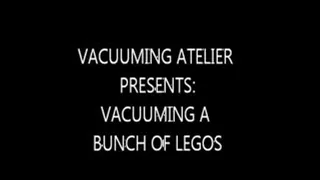 vacuuming a bunch of legos