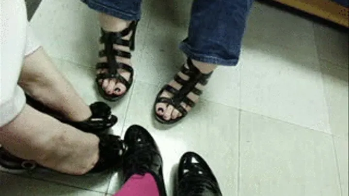 Three Girls Play Footsie in High Heels