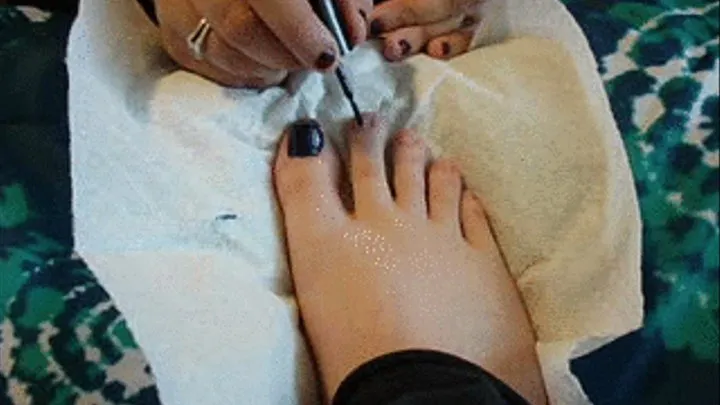 Painting Vanessa's Toenails