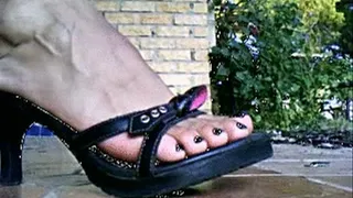 Black Mules up close dangle