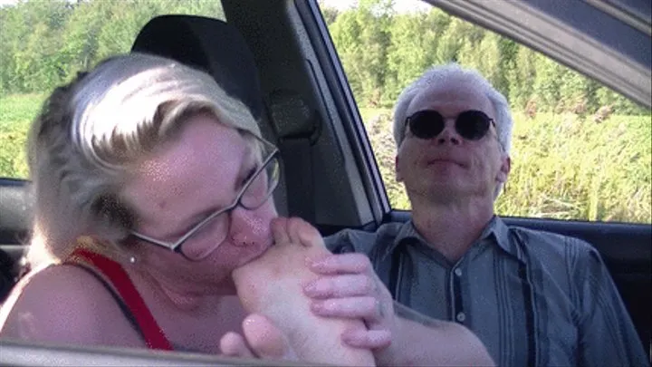 Foot love in his car