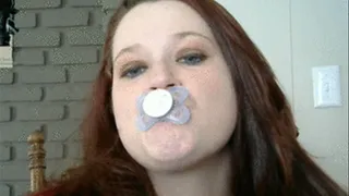 sucking on a passy 4