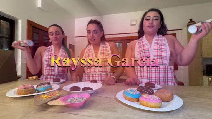 three girls make and have fun eating their cupcakes