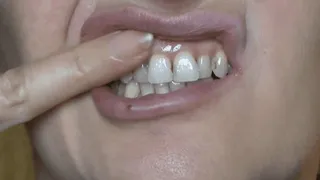 Rubbing my gums with my fingers